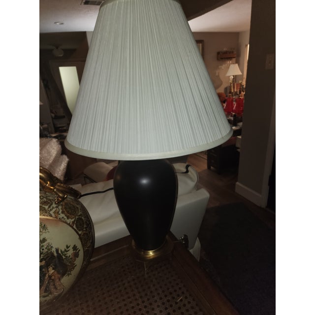 If you are looking for the definition of "quiet luxury," you have found it. This commanding pair of mid-century table...