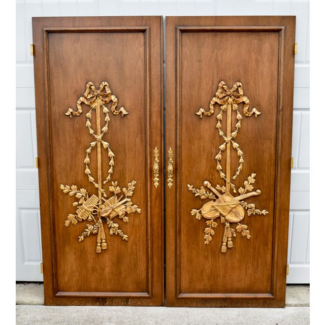 Vintage (1960's) Pair of Doors has a Hollywood Regency Style. Made of Wood. Carved & Gilded. Brown Finish with Gold...