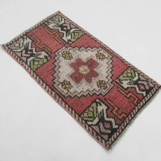 Vintage handknotted decorative mini rug from Konya region of Turkey. Approximately 50-60 years old. In very good condition.