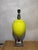 Beautiful table lamp, in perfect condition, acid yellow in color. The base and pineapple-shaped decoration are plated in...
