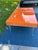 Orange Mid-Century Modern Style High-Gloss Orange Lacquered Wood and Lucite Greek Key Coffee Table by Julio Jimenez For Sale - Image 8 of 17