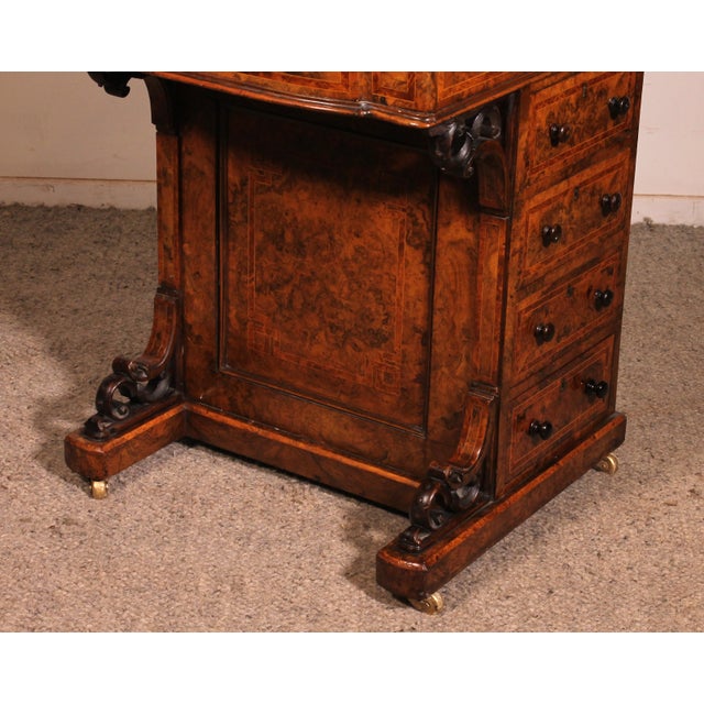 Exquisite burr walnut Davenport desk with inlays from the early 19th century. This small English piece, which can serve as...