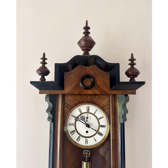 Stunning quality antique Victorian walnut & ebonised wall clock, having a quality antique 19th century wall clock with a...
