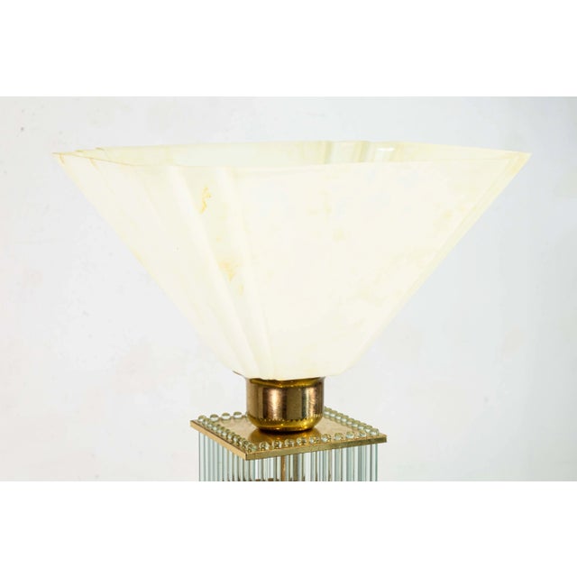 A pair of 1960s LIteline Chicago brass and glass cane table lamps. This extraordinary set of table lamps feature a...