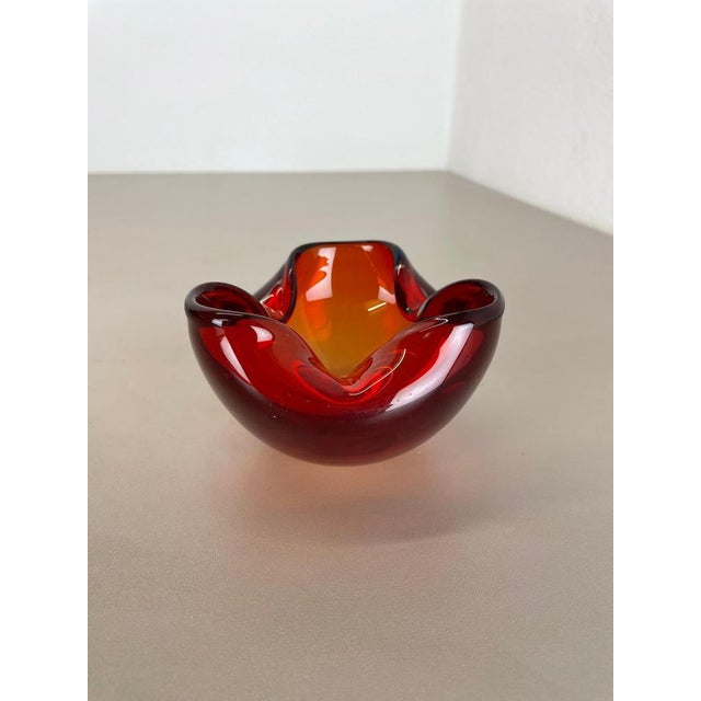 Article: Murano glass bowl, ashtray element Origin: Murano, Italy Decade: 1970s This original vintage glass bowl element,...