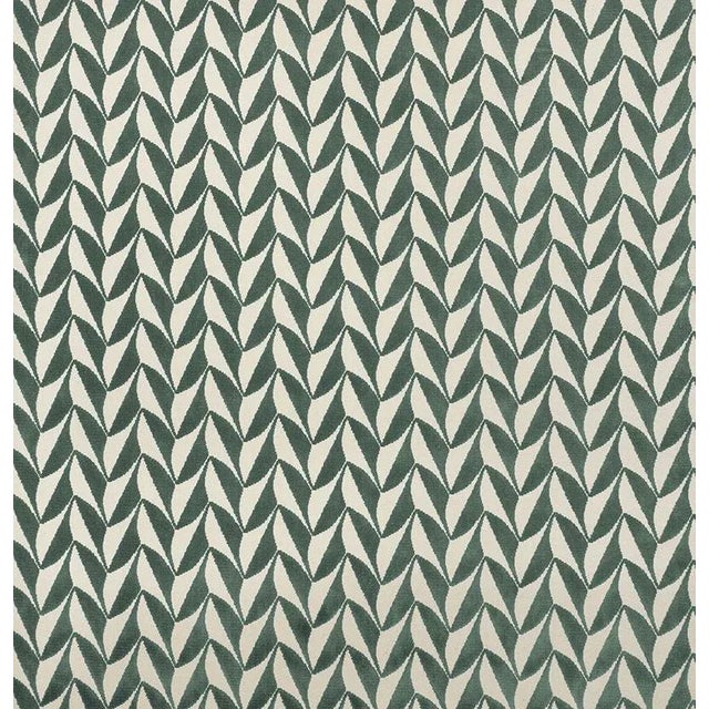 A chic, geometric cut velvet that makes a dashing statement on its own but also plays well with a wide range of other...