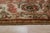 Giselle Zinnia Brown Hand Knotted Wool Rug, Country of Origin: China. This exquisite hand-knotted wool runner showcases...