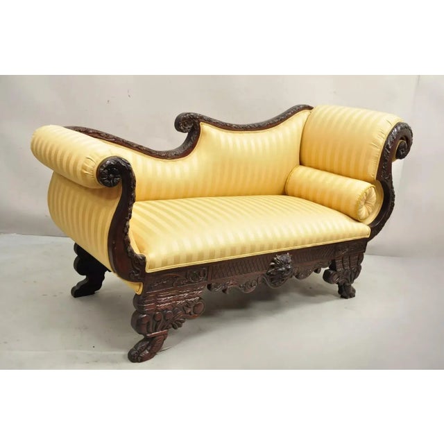 Antique American Empire Figural Carved Mahogany Recamier Gold Chaise Lounge Sofa. Item features a carved face to lower...