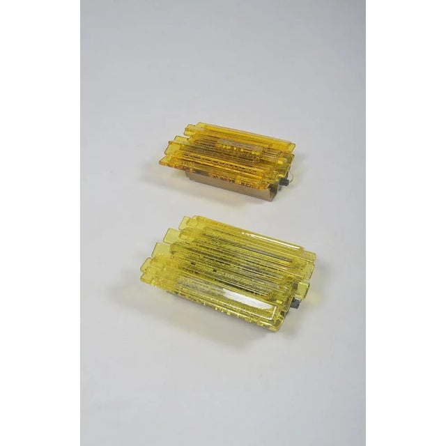 Set of 2 Danish wall lamps Veega 1420 designed in 1968 by Claus Bolby. This set is an earlier edition, manufactured by the...