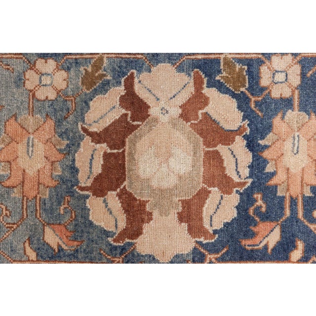 This exquisite antique rug, sourced from Doris Leslie Blau, showcases a rare blend of history and craftsmanship. The...