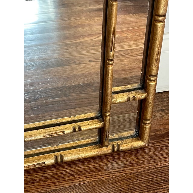 Unusual faux bamboo vintage mirror in a greek key motif. Very good condition, some loss to paper backing as seen. Heavy...