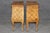 A striking and highly decorative pair of Italian bombe parquetry nightstands, masterfully crafted with elegant serpentine...