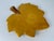 Ochre yellow ceramic serving plate. Vallauris. Stamped. In beautiful condition. Minor chipping on a few leaf tips (see...