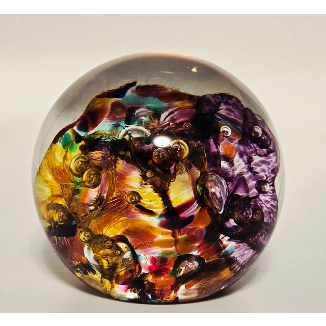 A dazzling example of Canadian studio glass, this signed Robert Held paperweight showcases the artist’s mastery of color,...