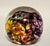 A dazzling example of Canadian studio glass, this signed Robert Held paperweight showcases the artist’s mastery of color,...