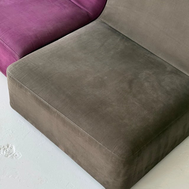 c. 2011. France. Matching sofa available. Modular pieces that are currently attached. Upholstered in two tone canvas.