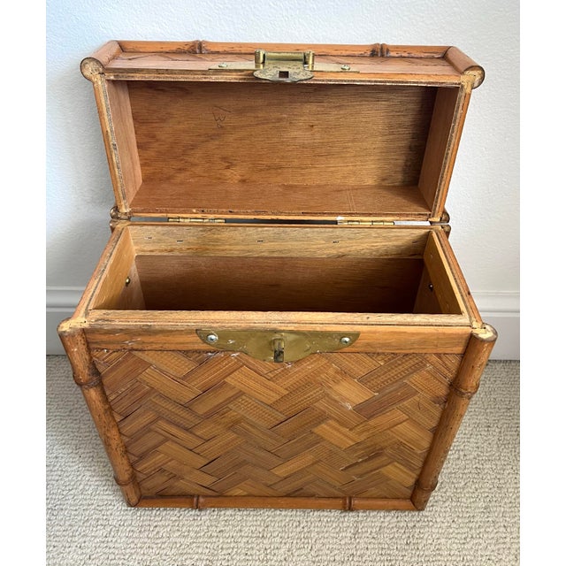 Stylish vintage rattan bamboo with brass closure storage box. Can be used for files.