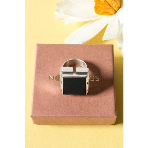 Very cool, brutalist silver ring by Helge Narsakka, with a large square onyx stone. Weight 18 grams.