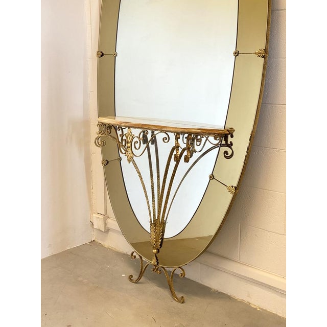 Crystal art mirror 1960s, golden iron structure and console, chipped surface in onyx