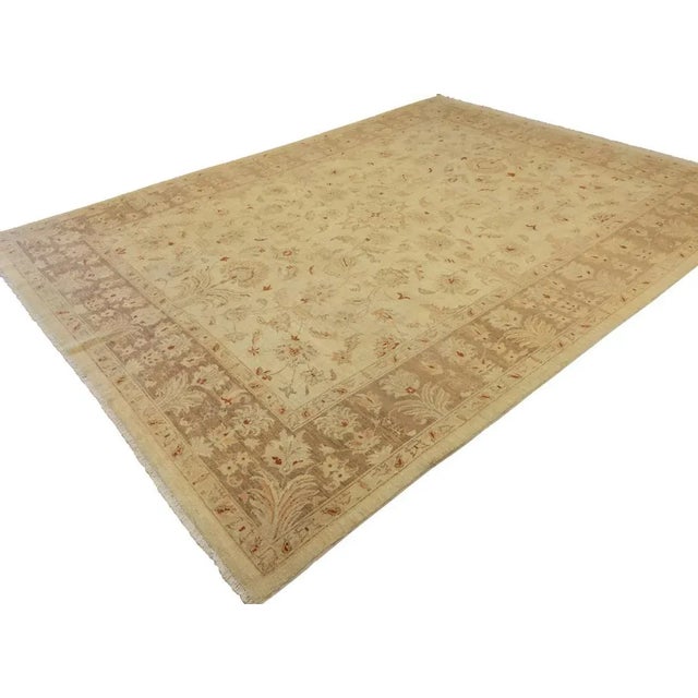 A Persian influenced Turkish hand knotted rug made by skilled artisans capable of creating the most exceptional vegetable...