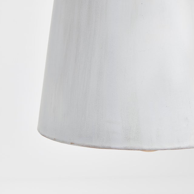 This modern pendant strikes the perfect balance. TheWhite matte wash is decidedly tranquil, while theGolden interior...