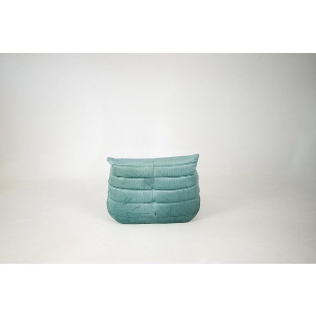 This Togo has been reupholstered with new foam and high-quality new fabric, keeping its inner structure, giving the item...