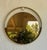 mirror with brushed brass frame and smoked mirror surrounded by wood, produced by modernindustria in the 70s This piece is...