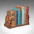 This is a vintage carved elephant book slide. An Anglo-Indian, mahogany home library stand, dating to the Art Deco period,...