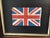Vintage Union Jack Flag set in an age related frame and under glass. Frame size is 12”x 10”. All measurements are...
