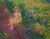 In the Garden by Dan McCaw | Oil Painting of a girl sitting in a vibrant garden For Sale
