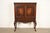 A gorgeous antique Chippendale or Georgian style bookcase, bar cabinet, or dining cabinet In the manner of Berkey & Gay...
