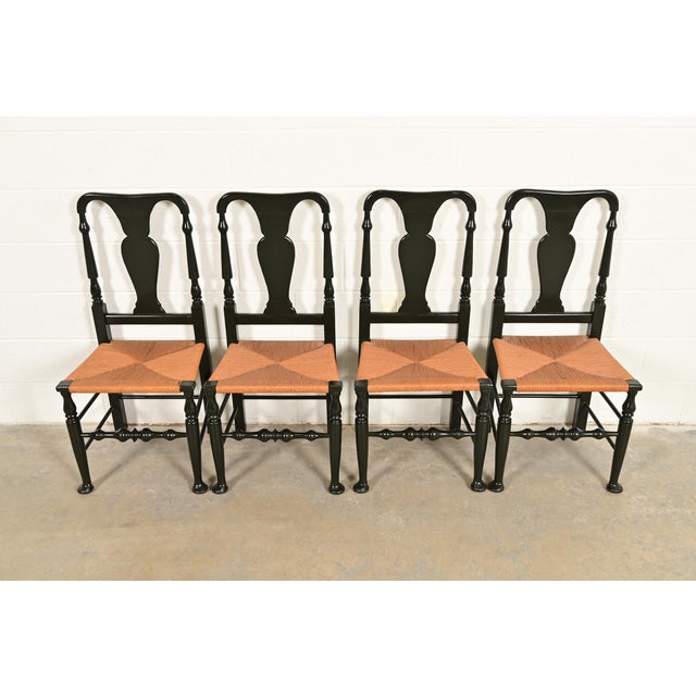 An outstanding set of four Early American or Queen Anne style dining chairs By Eldred Wheeler USA, Late 20th century Dark...