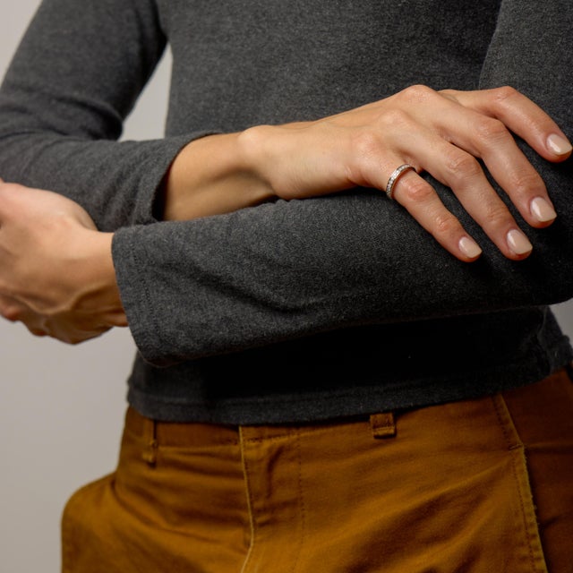 This refined vintage Cartier eternity band embodies understated luxury through precision and balance. A continuous row of...