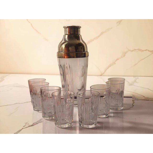 A 1930s Sèvres crystal cocktail set comprising eight glasses (8 cm high, 5.5 cm in diameter) and one shaker (25 cm high,...