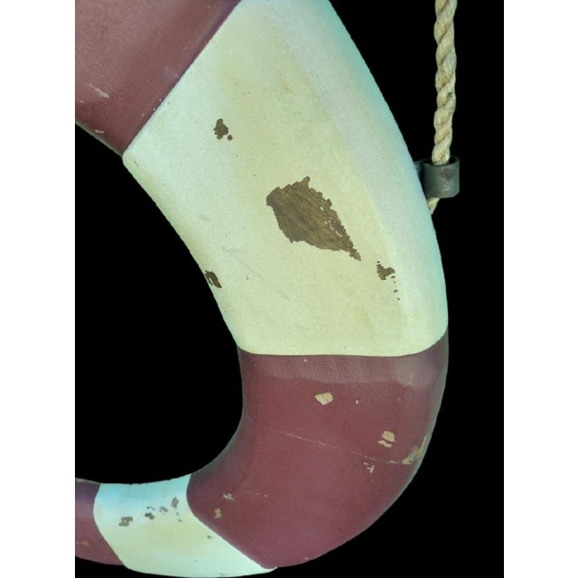 A wonderful and fun Coastal huge carved solid wood life saver wall decor by Lane Furniture. The life raft is extremely...