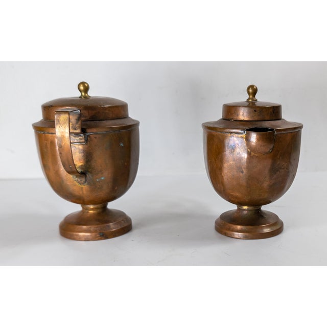 We are selling this great partial tea set. This sugar and creamer are made from copper and have a late Arts & Crafts style...
