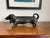 Bring charm and practical function to your entryway, porch, or garden with this substantial vintage cast iron dachshund...
