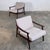 This pair of low-profile easy chairs is a quintessential example of mid-century modern design from the 1960s. Featuring a...