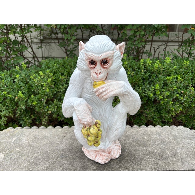 Italian Glazed Terracotta Monkey Sculpture. Offered is a beautifully detailed mid-century Italian Hollywood Regency glazed...