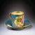 Elegant French porcelain cup and saucer, created in the late 19th century in the refined style of Sèvres. The set features...