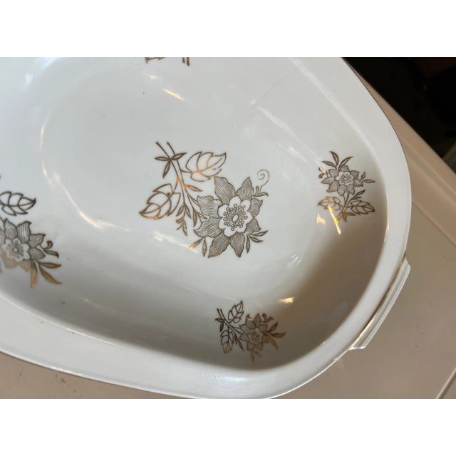 Vintage white fine China with Gold. Oval bowl. The bottom is marked Germany with the number 62 and a crown. This is...