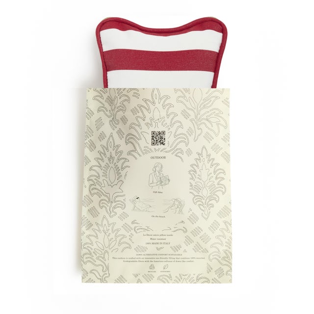 Bring a fresh Mediterranean touch to your outdoor spaces with this elegant striped cushion. Handcrafted in Italy from...