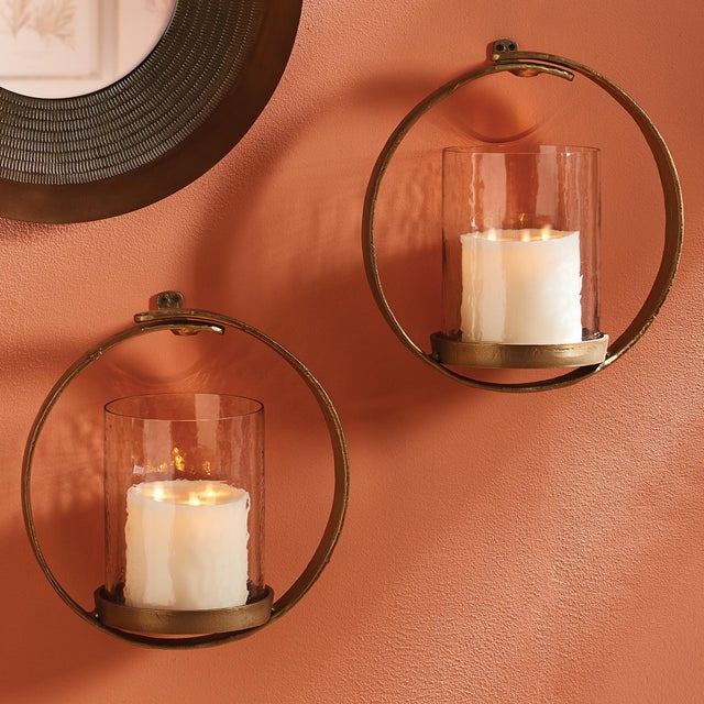 Finished in a burnishedGold, the Kempton Wall Candleholder adds a bit of bling. Illuminate a hallway for a rich, unusual...