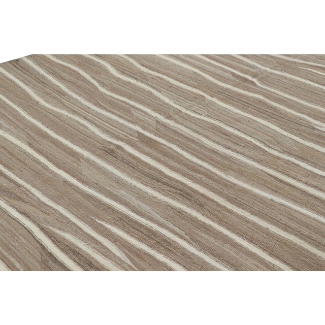 Made with handwoven wool, this 9x12 contemporary Kilim is a RICH and exciting new addition to both the KIlim & Flat Weave...