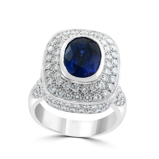 Approximately 4-5 Carat Ceylon Blue Sapphire & Diamond 18 Karat White Gold Cocktail Ring 4-5 Carat of blue Sapphire. This...