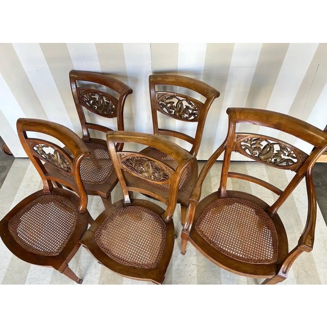 Set of 5 Italian Neoclassical Dining Room Chairs with Giltwood Carved Dolphin backs. Four side chairs and one armchair-...