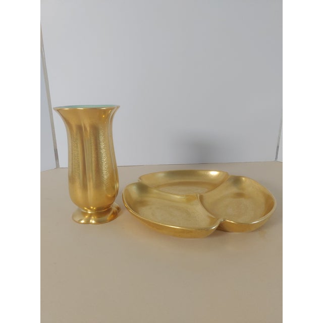 A set of real gold table accessories from the Pickard porcelain firm. They have been making beautiful pieces since 1893 in...