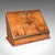 This is an antique admiral's writing station. An English, walnut and brass desktop correspondence or stationery case,...