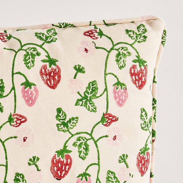 This pillow features Strawberry by Molly Mahon for Schumacher with a self welt finish. A grass-colored cotton-linen blend...