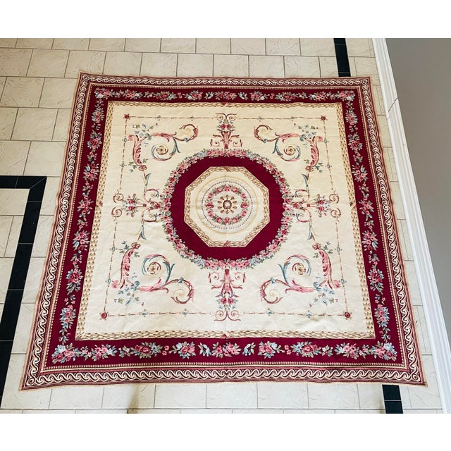 This large 1940s French vintage tapestry features a classic Aubusson-style medallion design, inspired by French decorative...